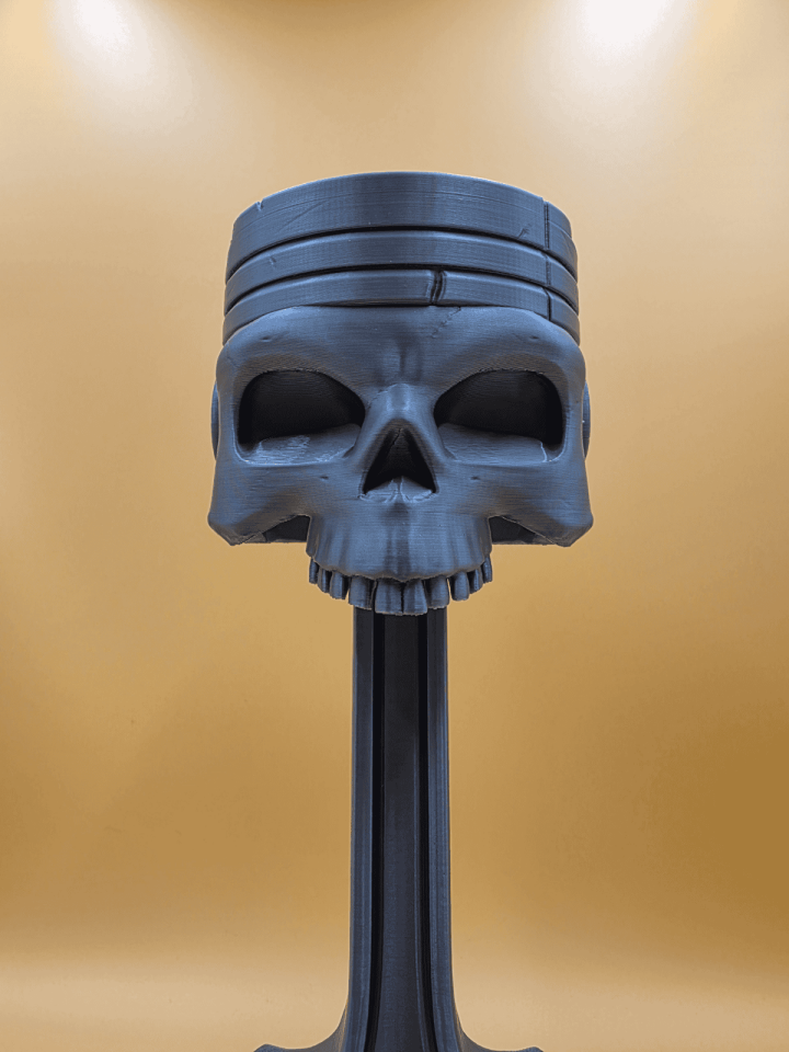 Piston Gövdeli Kurukafa Figürlü Kulaklık Standı